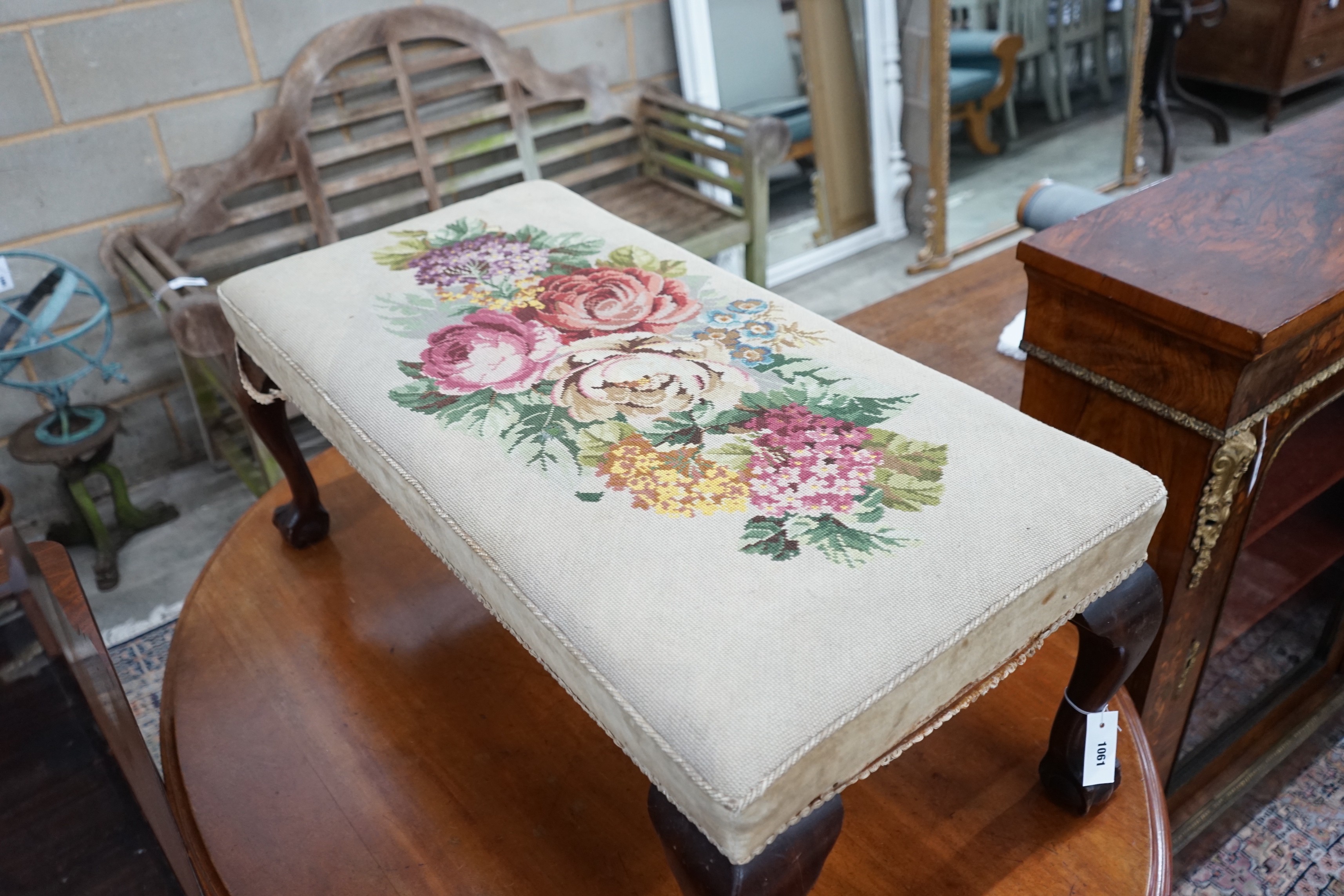 A George II style mahogany dressing stool with tapestry seat width 100cms, depth 50cms, height 40cms.